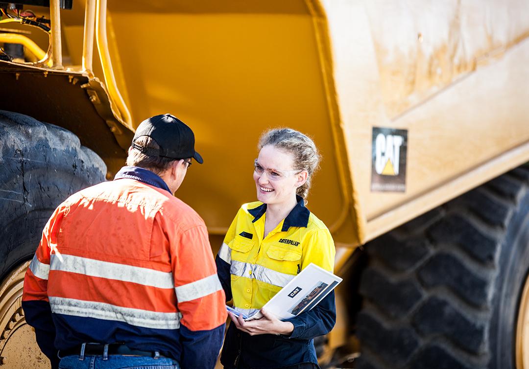 Student on work placement with CAT truck